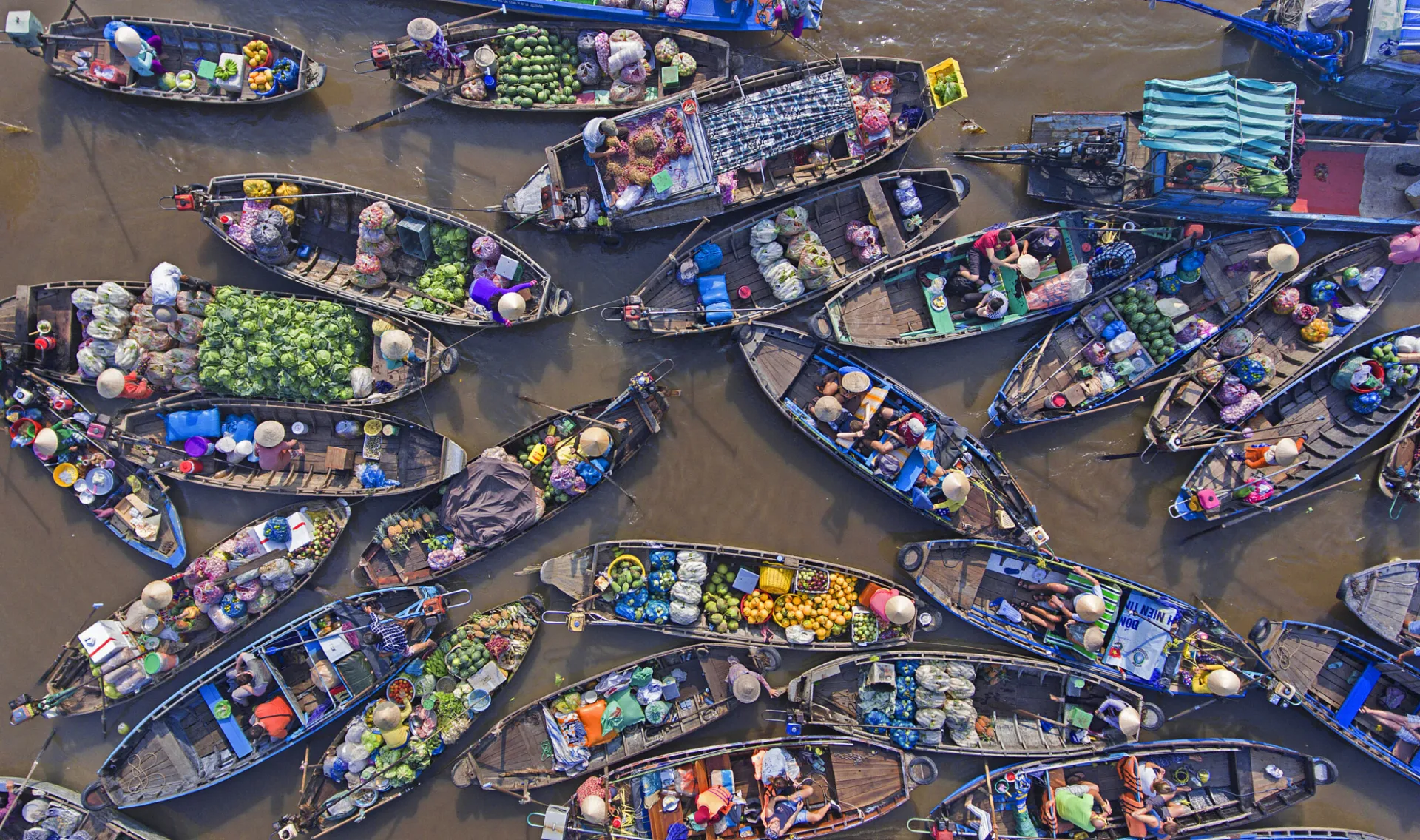 Le Marché Flottant de Cai Rang : L'Âme fluviale du delta du Mékong
